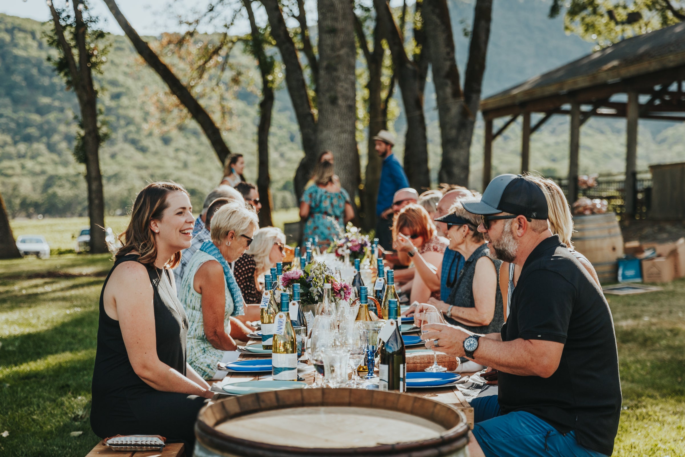 Group of people eating dinner outside